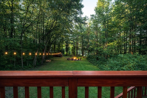Relax under the trees with string lights, a firepit, and p space to unwind.