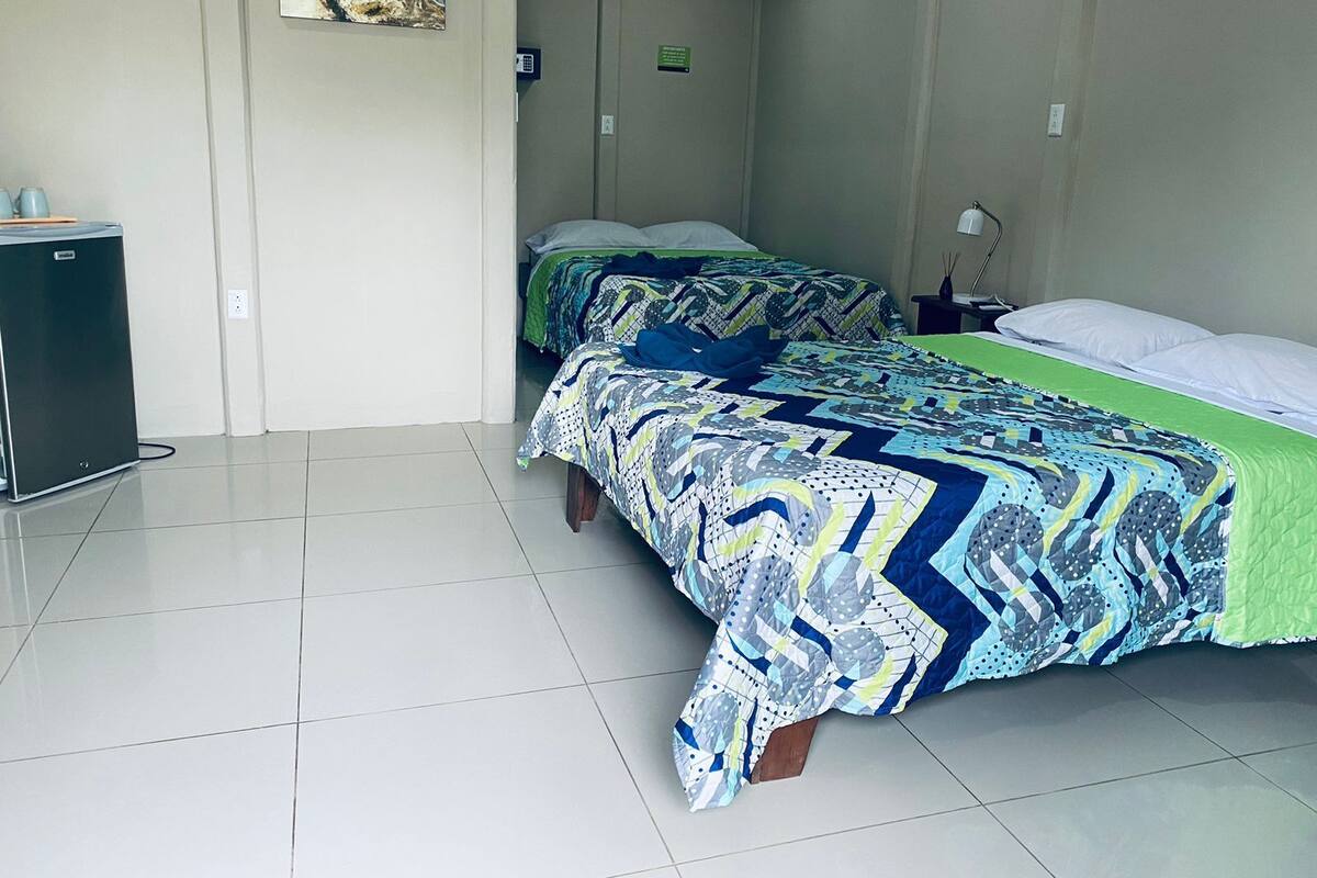 Basic Quadruple Room, 2 Double Beds, Non Smoking, Mountain View | Free WiFi, bed sheets