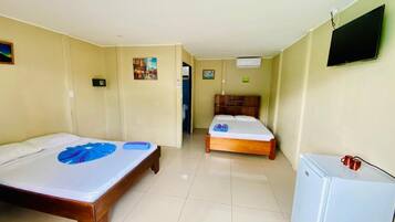 Basic Quadruple Room, 2 Double Beds, Non Smoking | Free WiFi, bed sheets