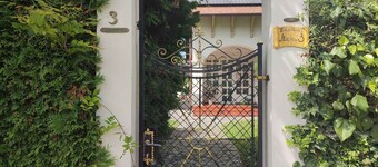 Holiday apartment with large garden, Wi-Fi and air conditioning