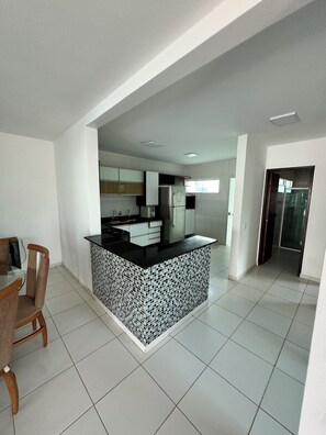 Fridge, stovetop, cookware/dishes/utensils