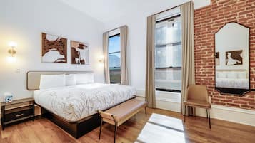 Deluxe Room, 1 King Bed | Premium bedding, in-room safe, desk, iron/ironing board