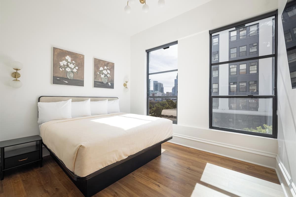 Deluxe Room | Premium bedding, in-room safe, desk, iron/ironing board