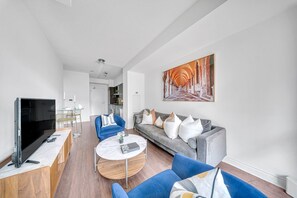 Economy Suite, City View | Living area | 55-inch LED TV with satellite channels - Bluejaysway (Toronto)