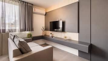 Apartamento | Área de estar | TV 43 polegadas com canais digitais, Netflix, serviços de streaming