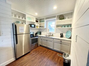 Coffee/tea maker, fridge, microwave, coffee grinder