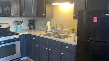 Fridge, microwave, oven, cookware/dishes/utensils