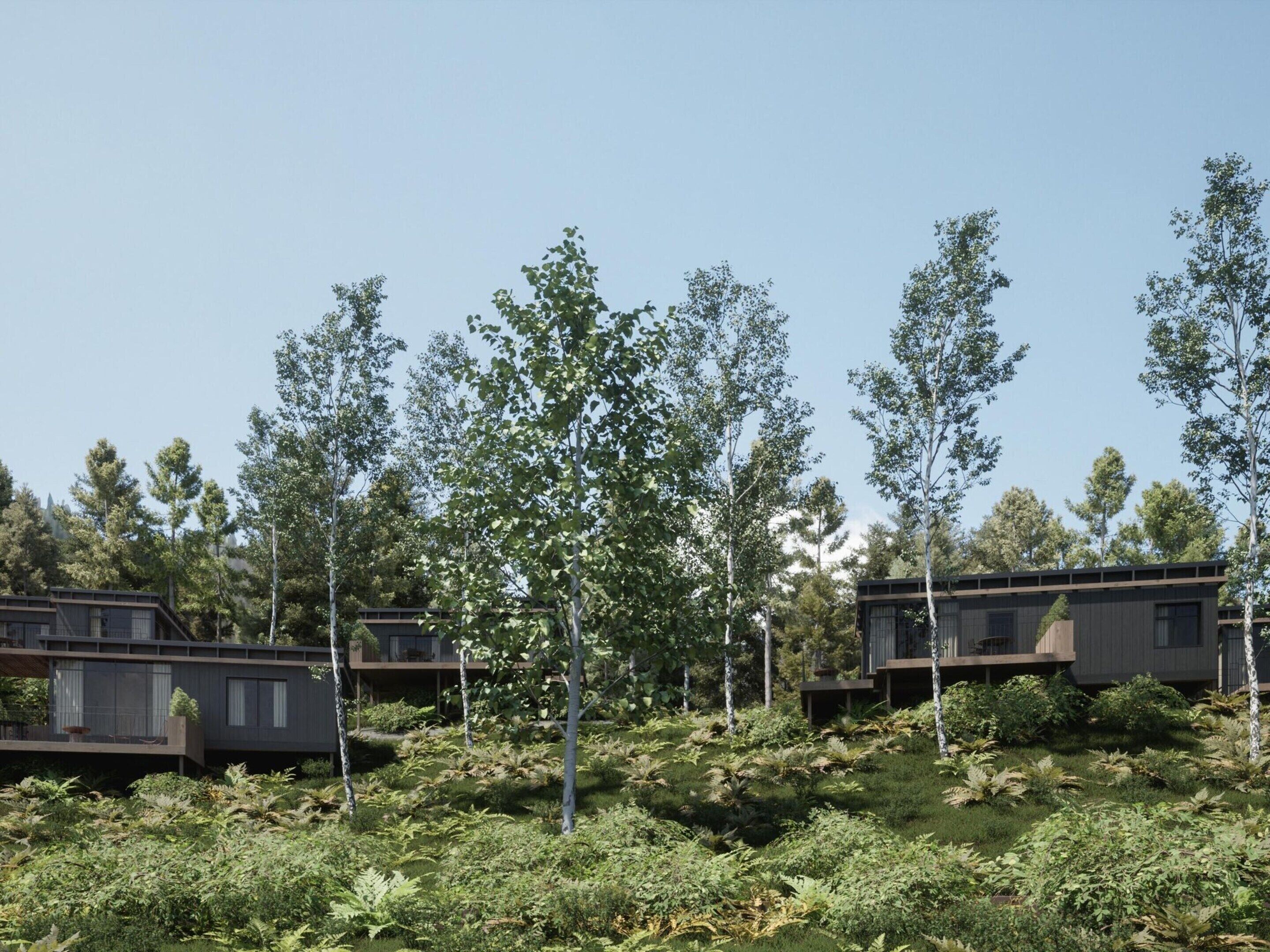 Een moderne woonwijk met meerdere tweelaagse huizen, omgeven door weelderige begroeiing en bomen.