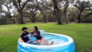 Outdoor spa tub - 1800-style cedar Log Cabin on Blisswood Ranch with many optional activities! (Cat Spring)