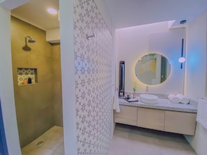 Shower, hair dryer, towels, soap