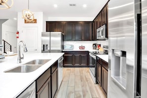 Townhome, Patio | Private kitchen