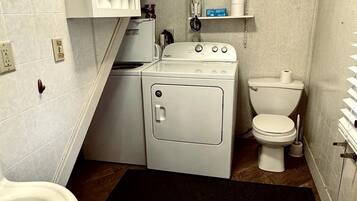 Hair dryer, towels, soap, shampoo