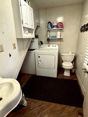 Hair dryer, towels, soap, shampoo