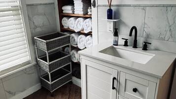 Hair dryer, towels, soap, shampoo