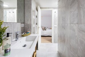 Hair dryer, towels, soap, shampoo