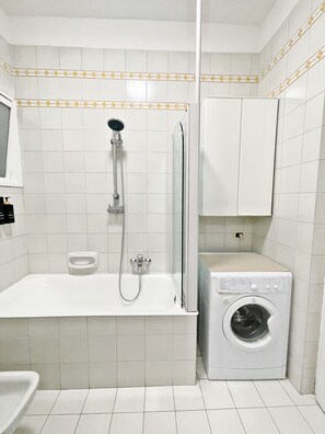 Hair dryer, towels, soap, toilet paper