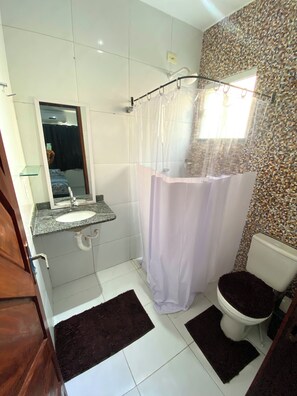 Shower, towels, toilet paper