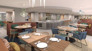 Een modern restaurant met ronde tafels en stoelen, een bar en een zithoek met banken en stoelen.