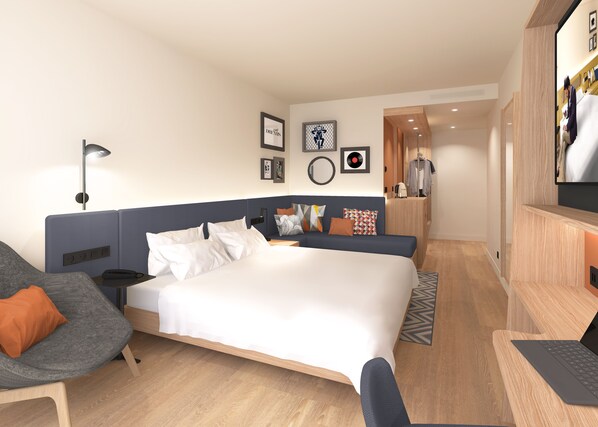 Une chambre d’hôtel moderne avec un grand lit, un bureau avec un ordinateur portable, une chaise et un canapé.
