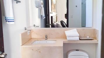 Shower, towels, soap, shampoo