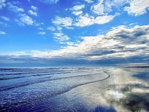 A beach with a clear sky and waves. - Shirley's Haven - UK46631 (Driffield)
