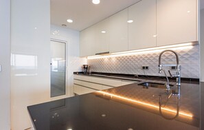 Fridge, oven, dishwasher, coffee/tea maker