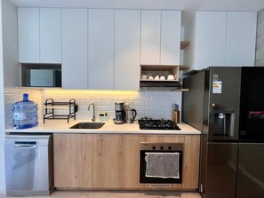 Fridge, microwave, oven, stovetop - Cozy & Classy flat in Paracas Bay with Balcony View on the Saltwater Lagoon (Paracas)