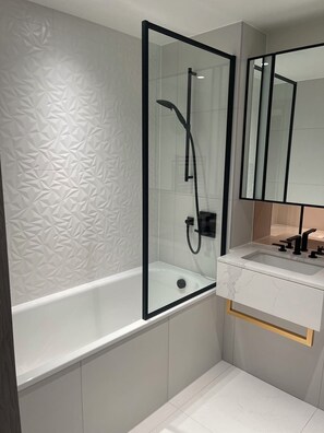 Hair dryer, towels, soap, shampoo