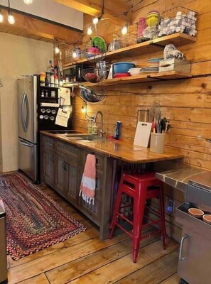Fridge, microwave, stovetop, coffee/tea maker