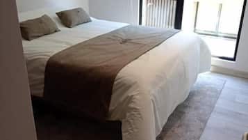 Departamento Superior 2 dormitorios | 客房內保險箱、筆電工作空間、遮光布/窗簾、熨斗/熨衣板