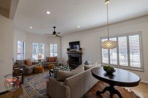 Smart TV, fireplace, books