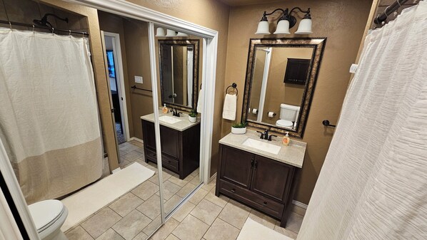 Hair dryer, towels, soap, shampoo