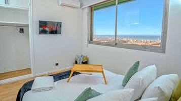3 habitaciones, tabla de planchar con plancha, cuna de viaje y wifi