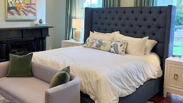 The Zeus Guest Room in The Athenian Historic Inn, features premium mattress, king size bed, and walk in shower