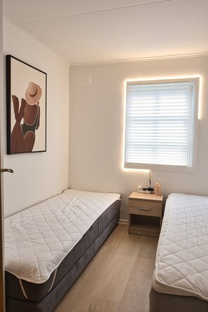 2 habitaciones, tabla de planchar con plancha y wifi gratis