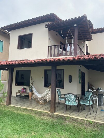 Quarto na praia com cama de casal