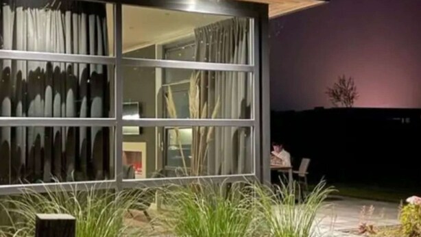 A modern building with large windows and a visible interior space. - Modern Holiday Home With a Deco Fireplace (Enkhuizen)