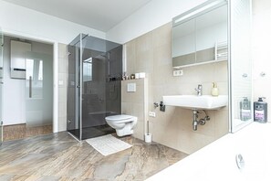 Shower, hair dryer, soap, shampoo