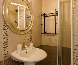 Regadera y secadora de cabello 