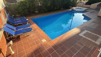 Seasonal outdoor pool, open 8:00 AM to 8:00 PM, sun loungers