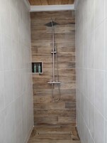 Deluxe Double Room, Garden View | Bathroom | Shower, towels, toilet paper