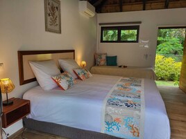 Deluxe Double Room, Garden View | In-room safe, individually decorated, blackout drapes, free WiFi