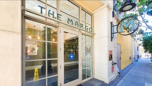 A storefront with a sign reading "THE MARGO".