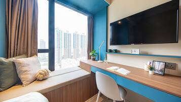 Laptop workspace, free WiFi, bed sheets