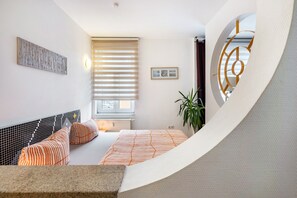 1 habitación, tabla de planchar con plancha, wifi gratis y ropa de cama 