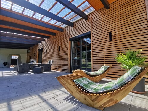 Ferienhaus "Hainberg-Loft" mit großer Veranda, Gartensauna und viel Raum für Erholung