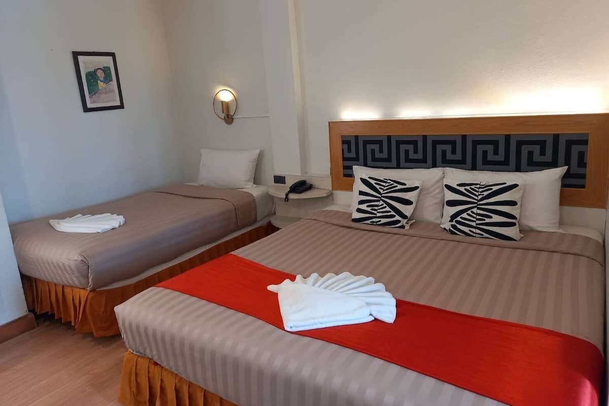 Chambre Triple Deluxe, 3 chambres | Lits supplémentaires
