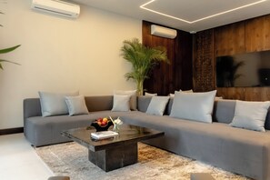 Villa, 5 Bedrooms, Pool Access | Living area | 90-cm Smart TV with cable channels, Netflix, streaming services - AMO Residences (Canggu)