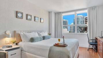 Iron/ironing board, travel crib, WiFi, bed sheets