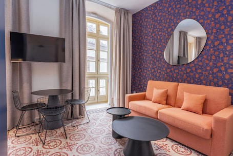 Apartment | Living area | 40-inch LED TV with cable channels